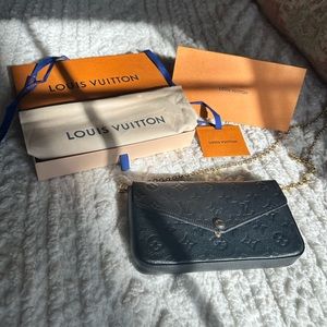 Black leather louis vuitton crossbody bag with gold chain strap